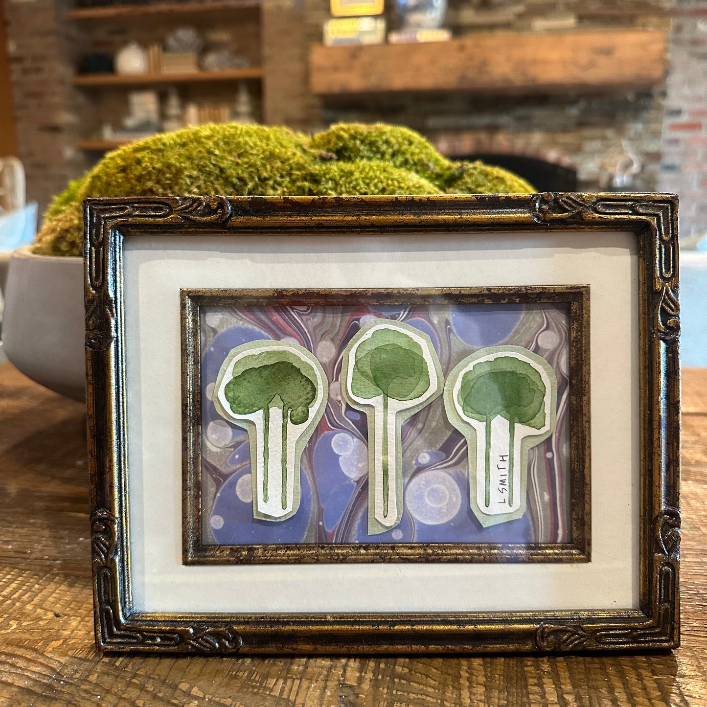 Green trees on marble paper