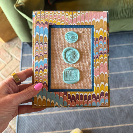 Wax Seals on Marble Frame